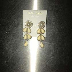 Kate Spade 2 inch white acrylic and surgical steel 2 inch chandelier earrings