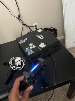 Sony PlayStation 4 Console with Controller
