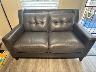 Beautiful black leather loveseat