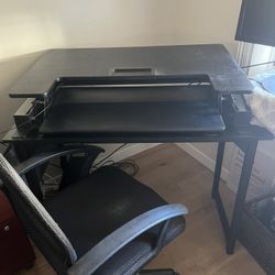 Vari Desk Along With Black Desk And Chair