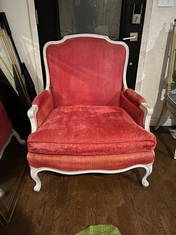 Red vintage French chair with cream wood legs