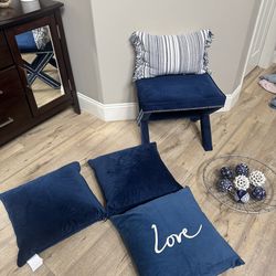 Navy blue velvet toss pillows, ottoman and more