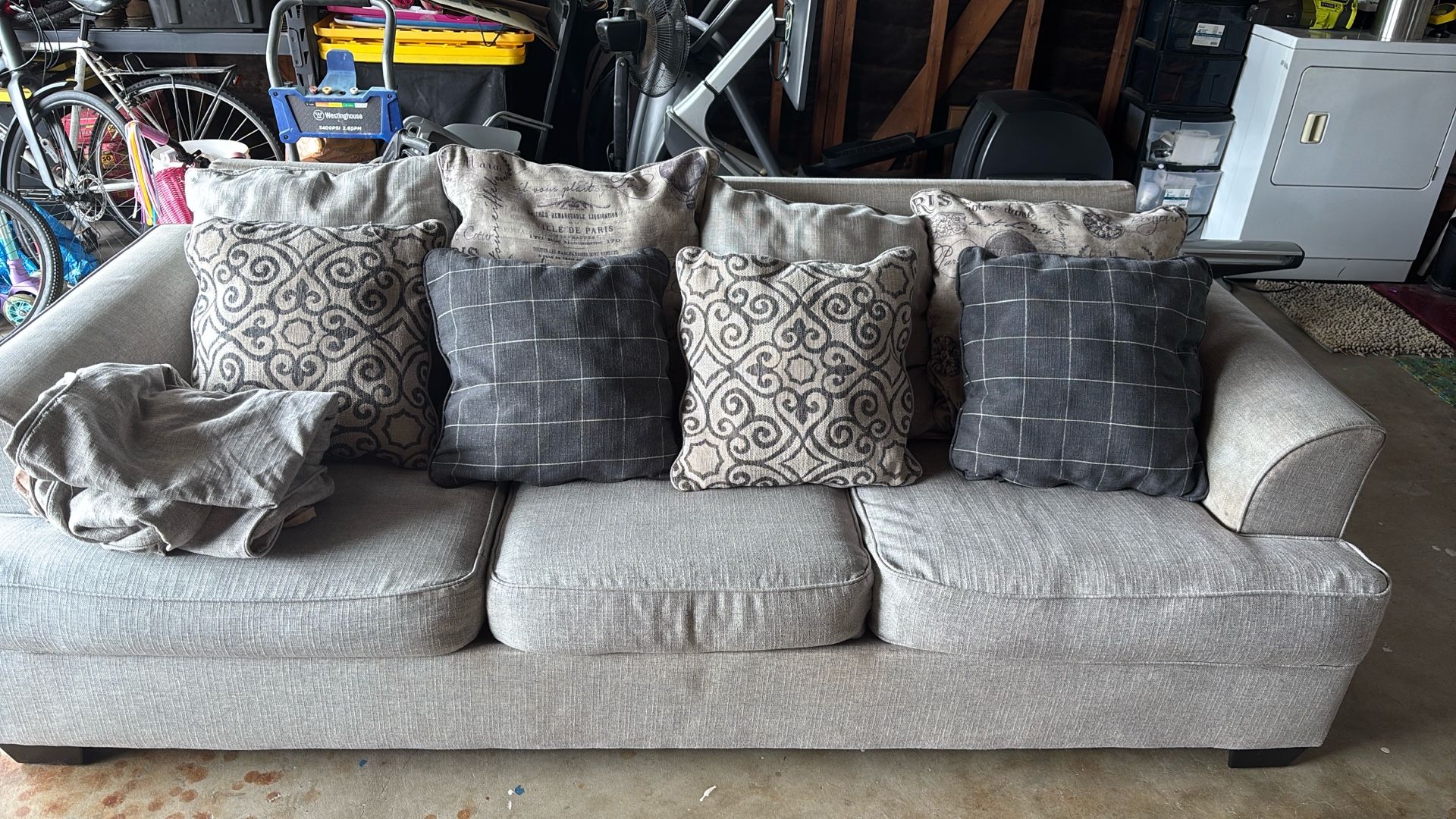 $100 - Wide 3 Seater Ashley Couch With Extra Washable Pillow Cases
