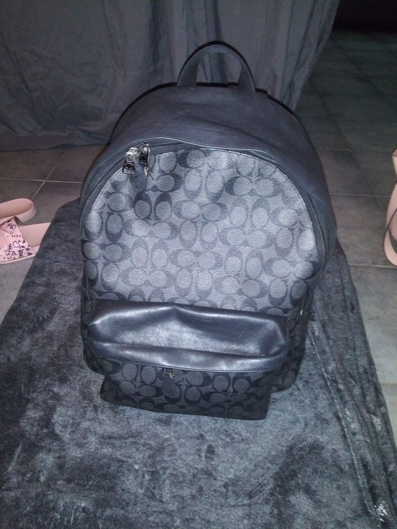 Authentic men's black Coach backpack