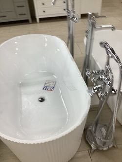 59” bathroom freestanding bathtub in white color fluted design very modern new with center drain ready for pickup today