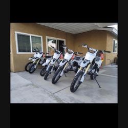 **Brand New Dirt Bike 125cc** - Adult size. - Kick Start. - Manual with Clutch. - 4 gears. - Mph 55-60 - Support up 450 lbs. - Alloy rims and suspensi