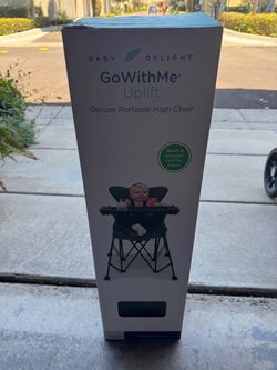 Portable high chair, easy setup, great condition.
