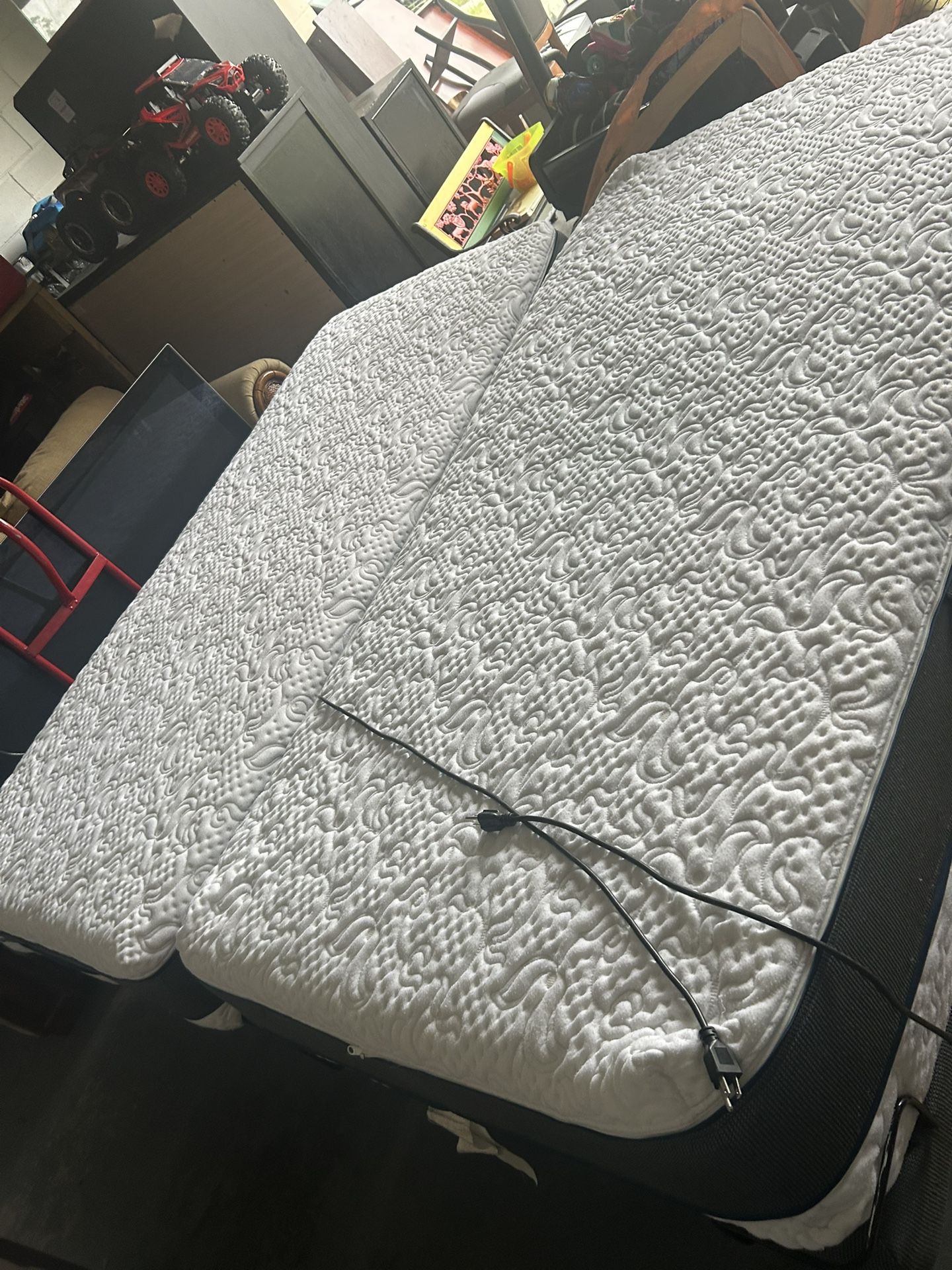 Two twin XL foam memory motorized frame beds, and very good condition