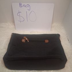 New bag with shoulder strap.