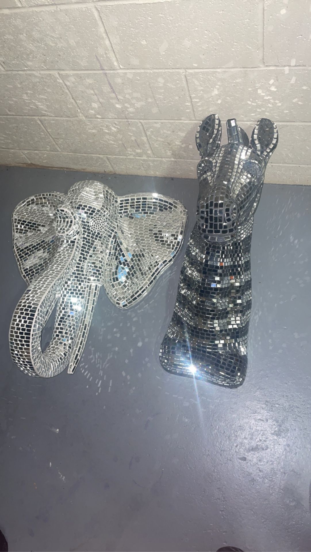 Unique Elephant and zebra head statues 