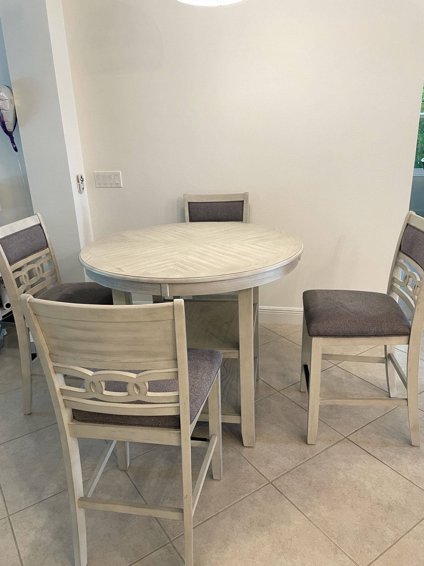 Breakfast Table 41” Diameter 36” Height with 4 matching chairs