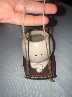 Hanging swing character planeter