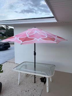 Glass Top Outdoor Patio Table and Umbrella