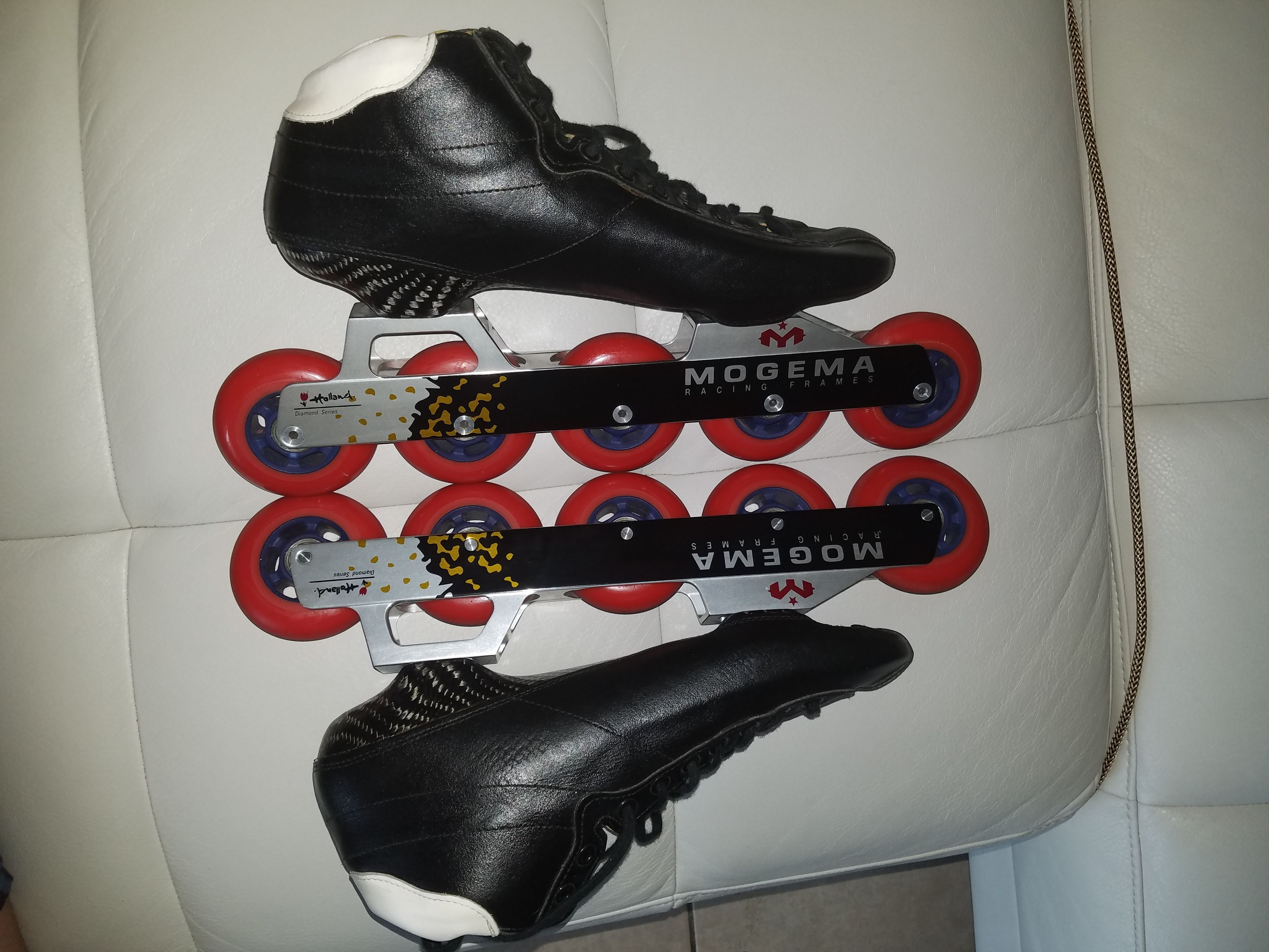 Mogema Racing Frames "Holland Diamond Series" w/ blk "Ridell" boot & 5 red Ultimate Indoor Racing Energy Plus wheels