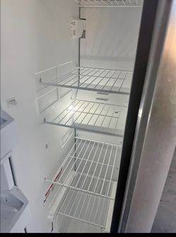 Side by side Whirlpool refrigerator