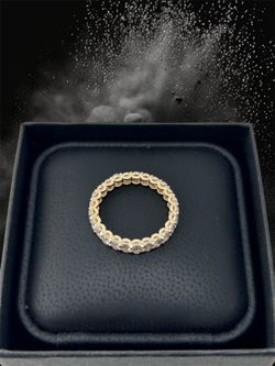Oval shape diamond eternity band in yellow gold