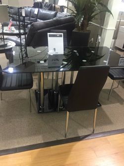 Glass top table and chairs