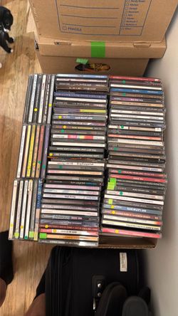 Five banker boxes full of CDs