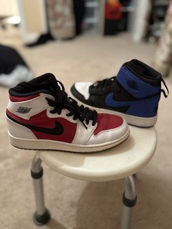 Two Pairs Of Jordan Mids 