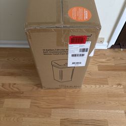 New itouchless stainless steel 13 gallon trashcan box never opened