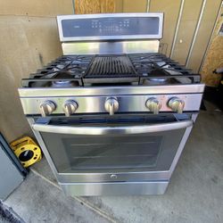 GE gas stove 5 burners stainless st with griddle.  30”