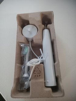 NEW SONICARE ELECTRIC TOOTHBRUSH