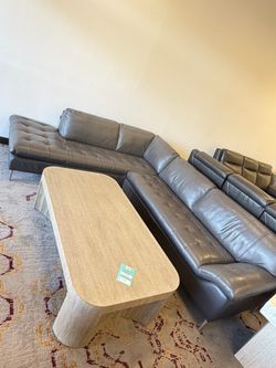 Chateau Dax- Cortisa 2 pc leather sectional sofa. Retail price $5822