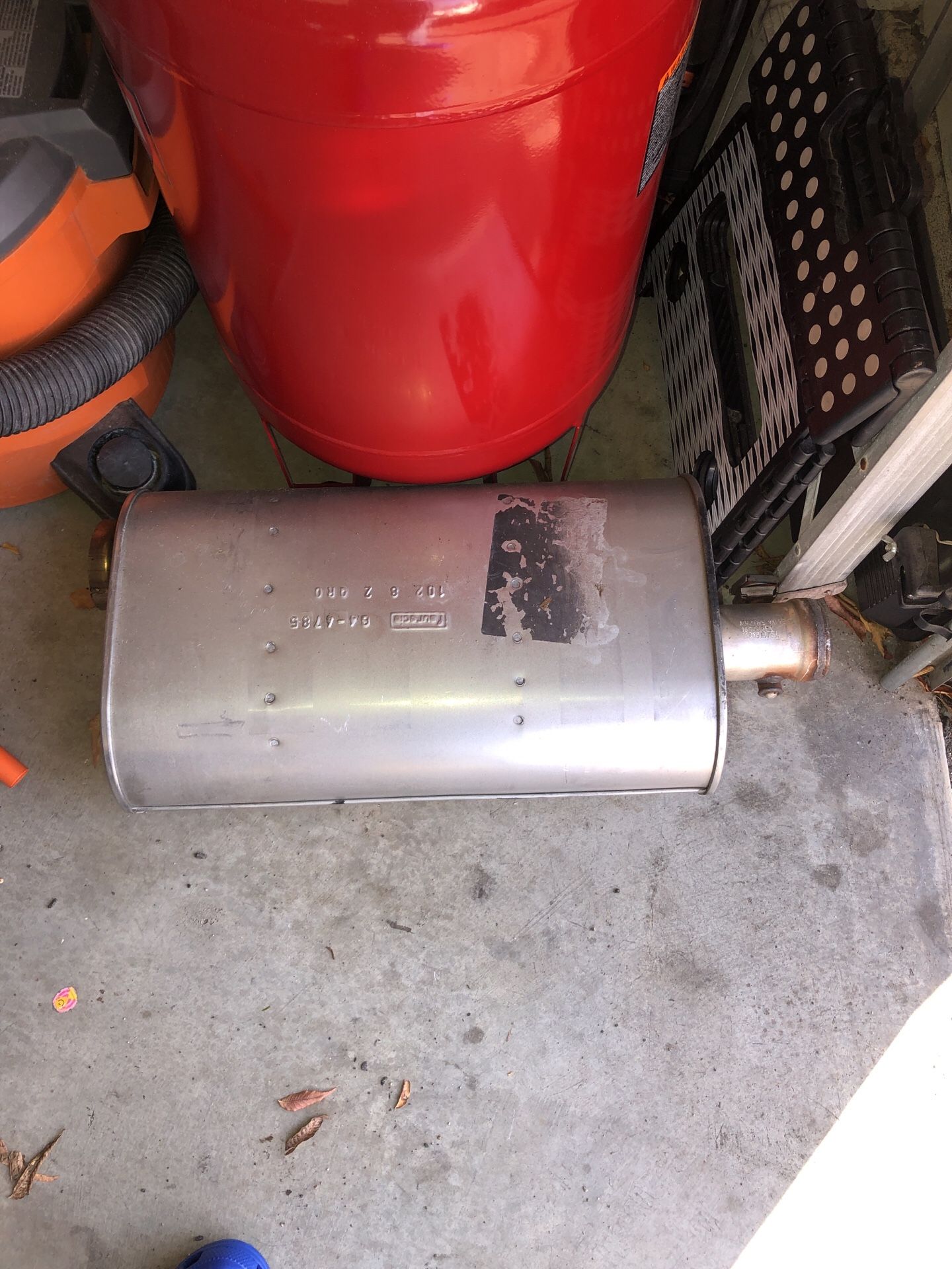 OEM GMC Sierra or Chevy Silverado muffler with flapper valve