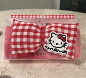 The creme hello kitty plush spa headband