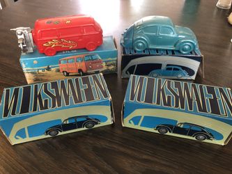 Vintage Avon cologne bottles in Volkswagen Beetle and Bus shape