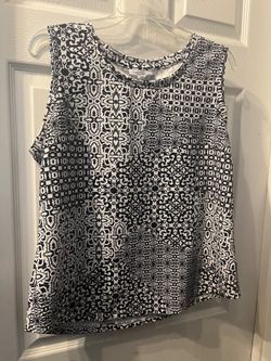 Blue and white sleeveless top