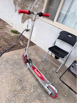 Adult scooter for sale very very good condition just. Needs a charger. Shoot me a reasonable offer plz