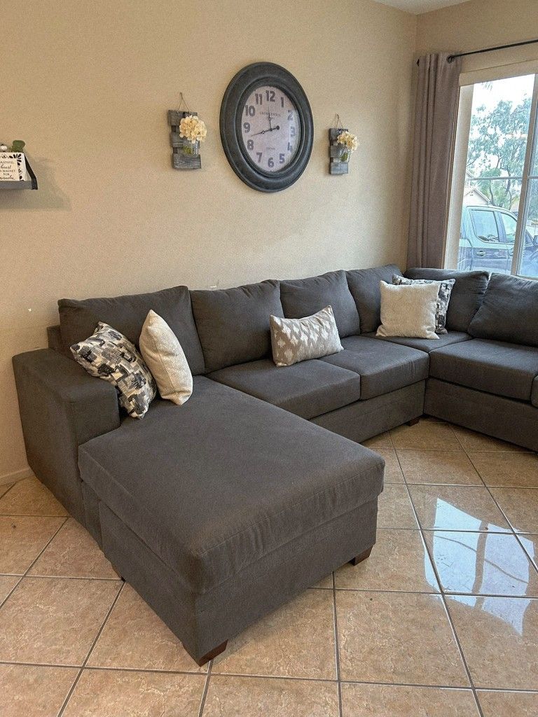 Large And Beautiful Dark Grey Sectional Couch From Living Spaces