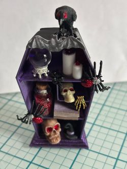 Mini coffin filled with scary things