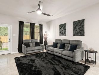 Gray Reclining Sofa and Loveseat Set