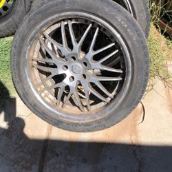 Four Matching 06 VW Golf Mag Wheels
