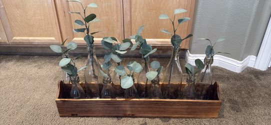 Rustic Wooden Crate with Glass Bottles and Eucalyptus