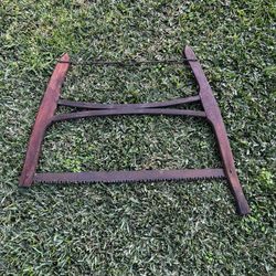 Antique buck bow cross cut saw