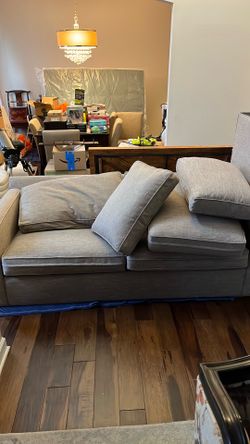 Crate and barrel sleeper sofa, two side chairs, two glass end tables and glass coffee table