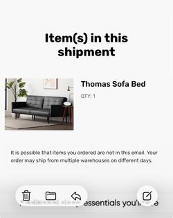 Black futon with foot stool