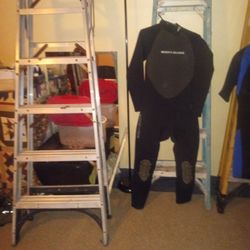 Wet Suit(Long Bodyglove) Then A Shorts Wetsuit  Scuba Quest
