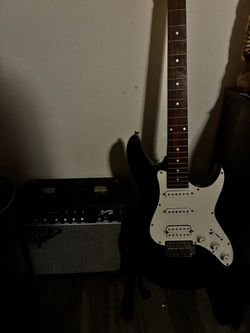 Black Stratocaster-Style Electric Guitar with Fender Frontman Amp