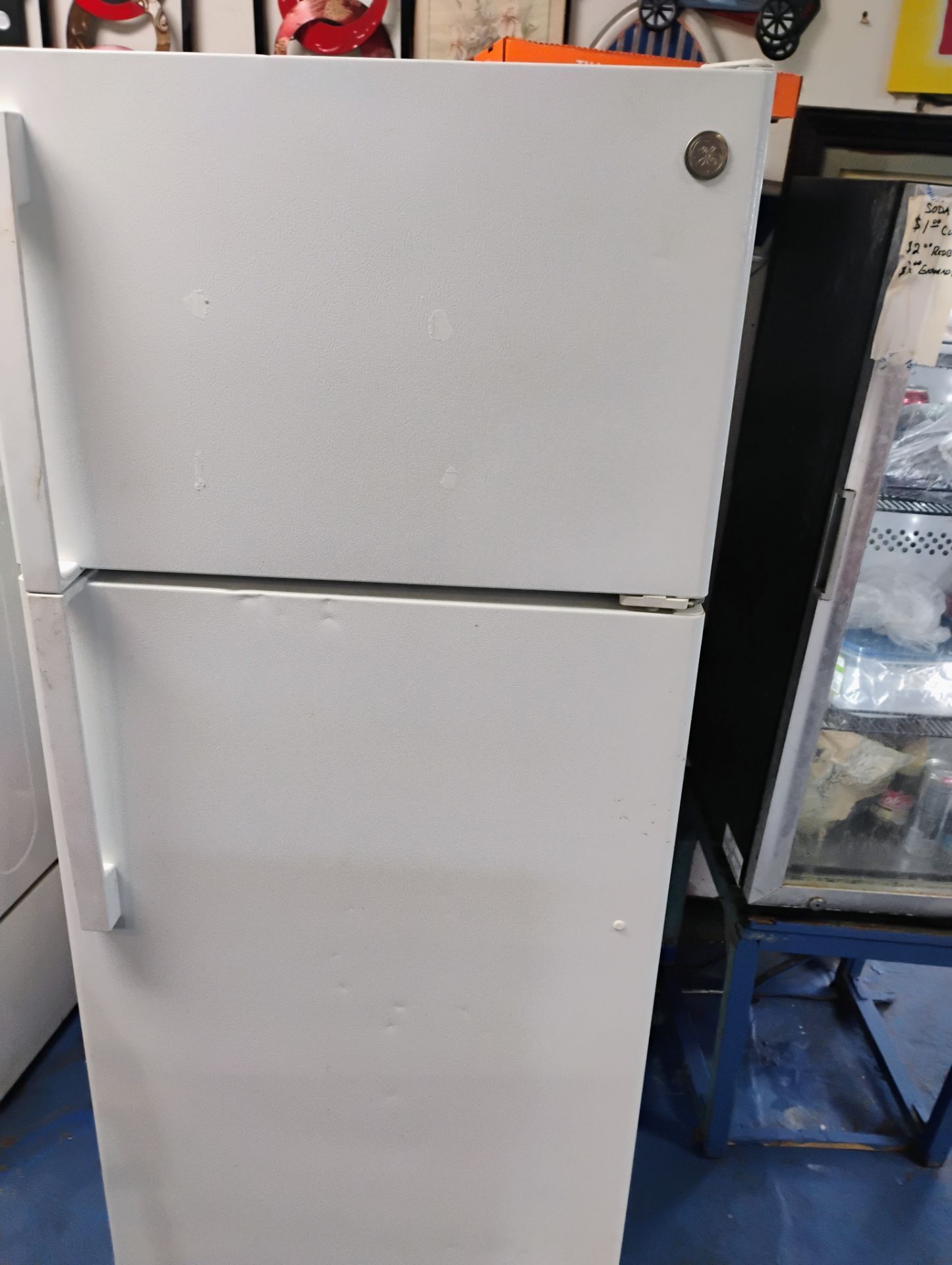 Ge white refrigerator plugged in $175