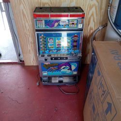 Old Slot Machine.  Turns On. Needs Work