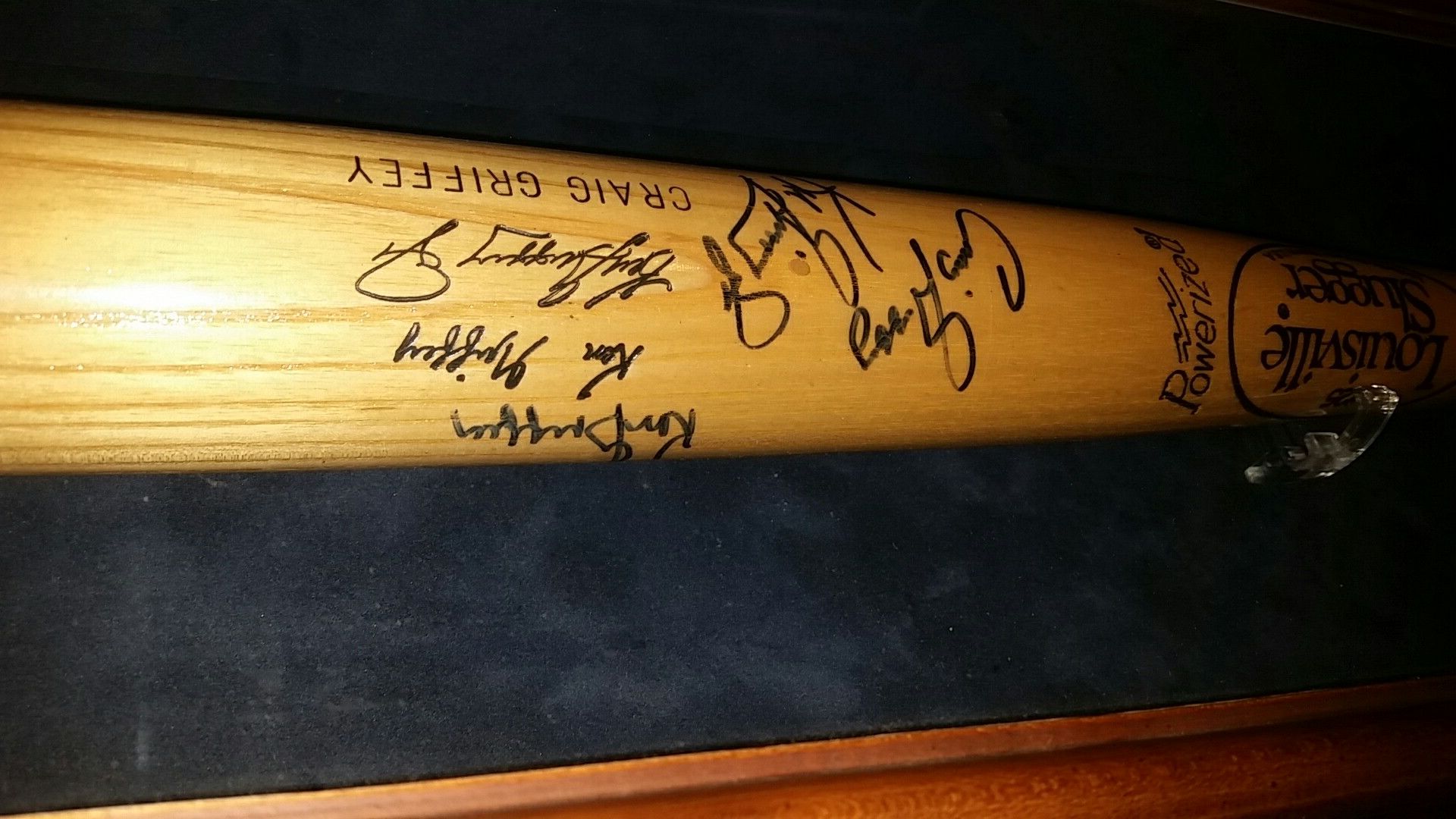 Ken Griffey family signed Baseball Bat.