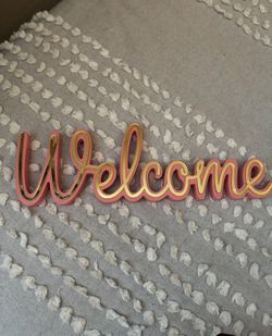 Pink Welcome Sign