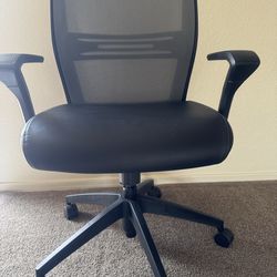 Used adjustable black leather office chair