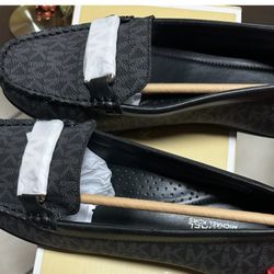 Michael Kors shoes. Size 7.5, but they're too big. They fit like a size 8. $85 each.