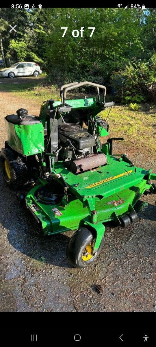 Commercial stand on John Deere, Riding mower.