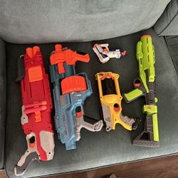 Assorted Nerf guns.